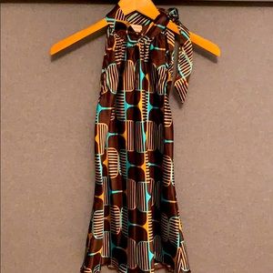 Vibrant colored blouse.